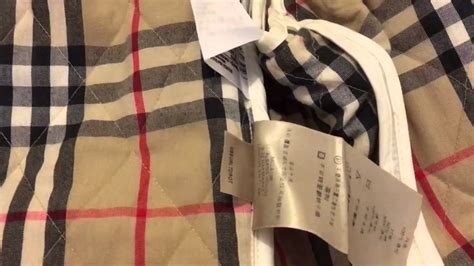 how to spot a fake burberry quilted jacket|spotting a burberry coat.